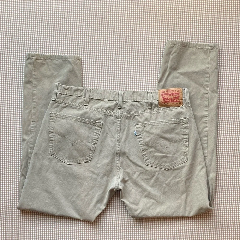 Levi's 502 tan pants. Size 36. HEMMED‎